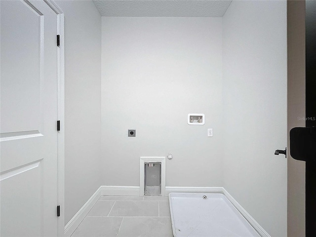 washroom featuring electric dryer hookup, washer hookup, hookup for a gas dryer, baseboards, and laundry area