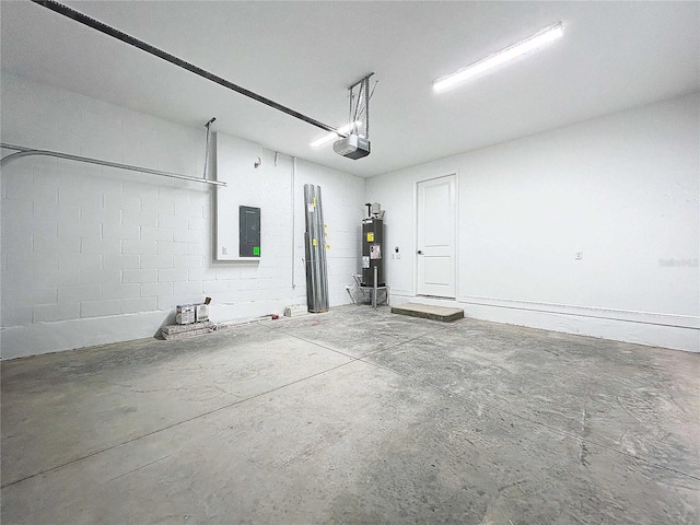 garage with water heater, concrete block wall, a garage door opener, and electric panel