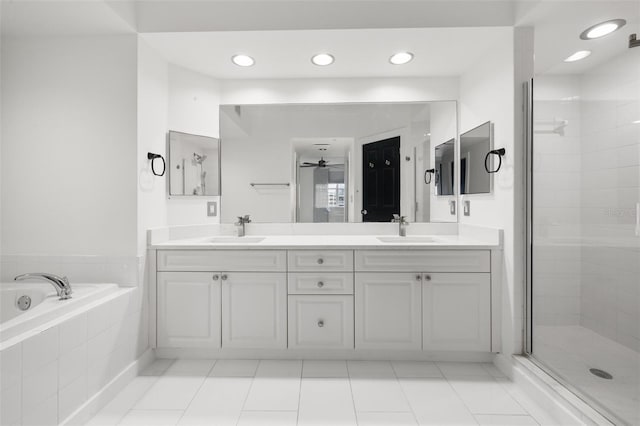 bathroom with vanity, separate shower and tub, tile patterned floors, and ceiling fan