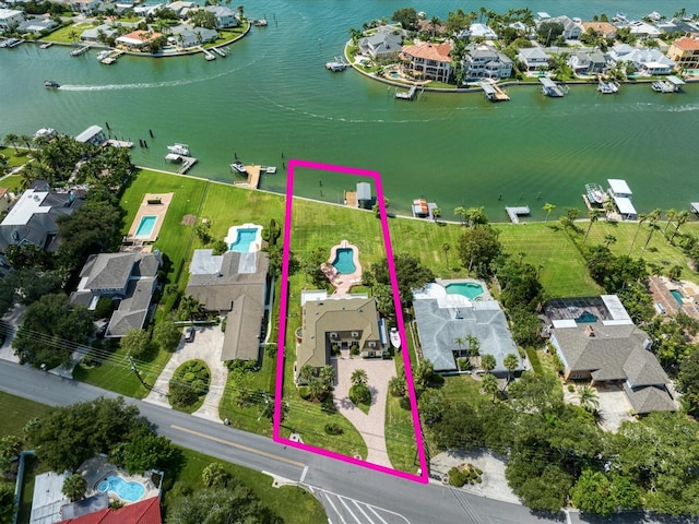 birds eye view of property featuring a water view