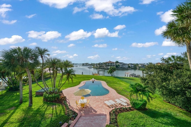 surrounding community featuring a yard and a water view