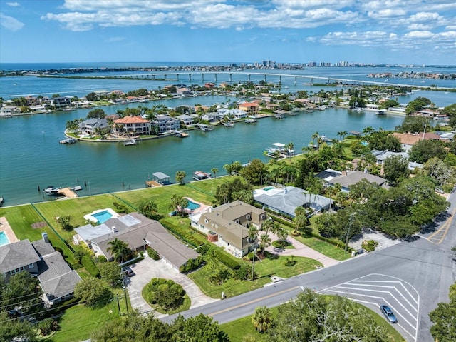 birds eye view of property featuring a water view