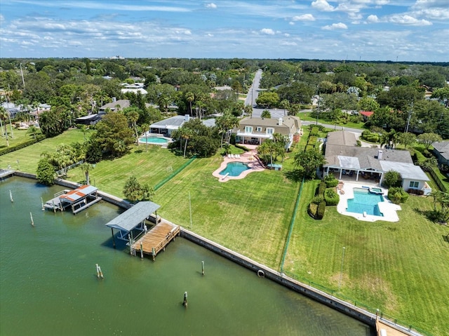 birds eye view of property featuring a water view