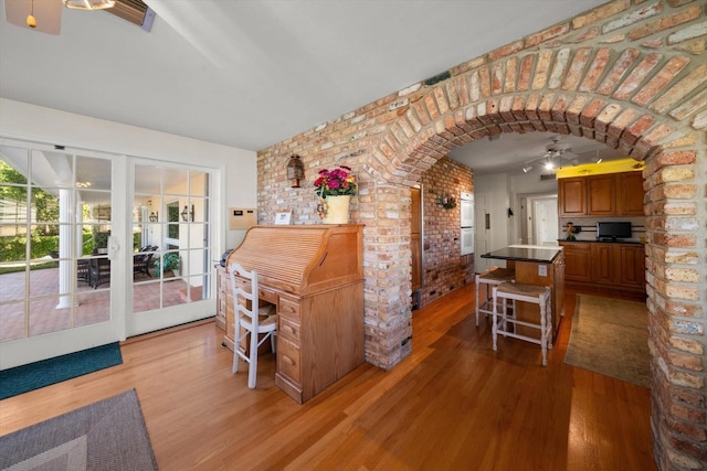 interior space featuring ceiling fan and french doors