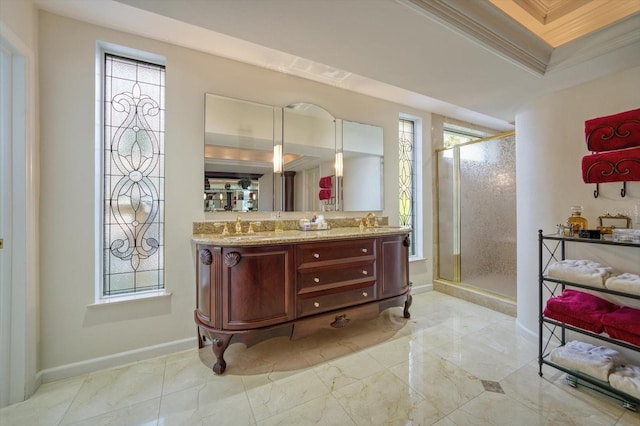 bathroom with a shower with door, oversized vanity, tile floors, and ornamental molding