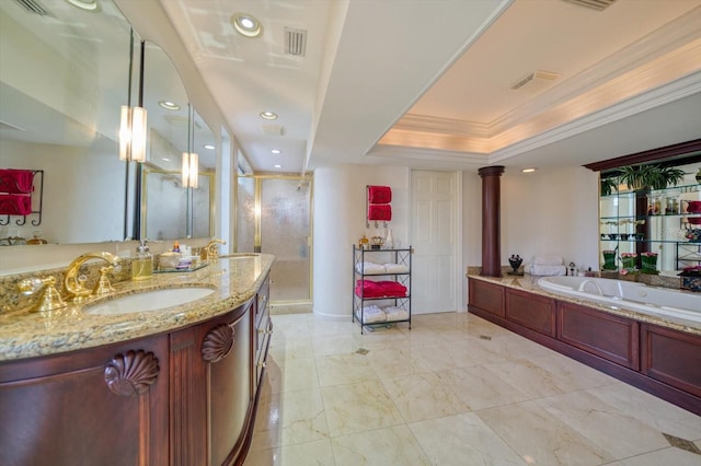 bathroom with vanity with extensive cabinet space, ornamental molding, tile floors, and a tray ceiling