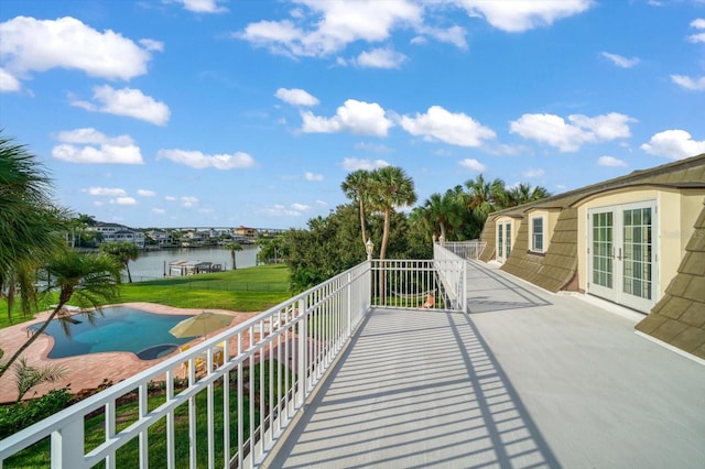 view of patio featuring a water view