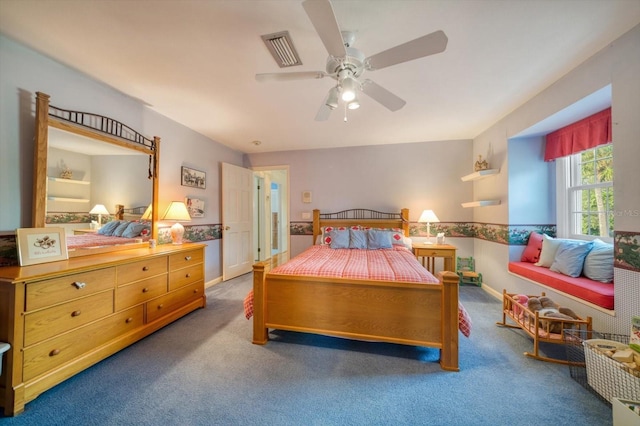 bedroom featuring ceiling fan and dark carpet