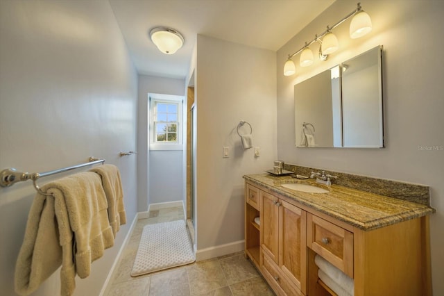 bathroom with vanity and tile floors