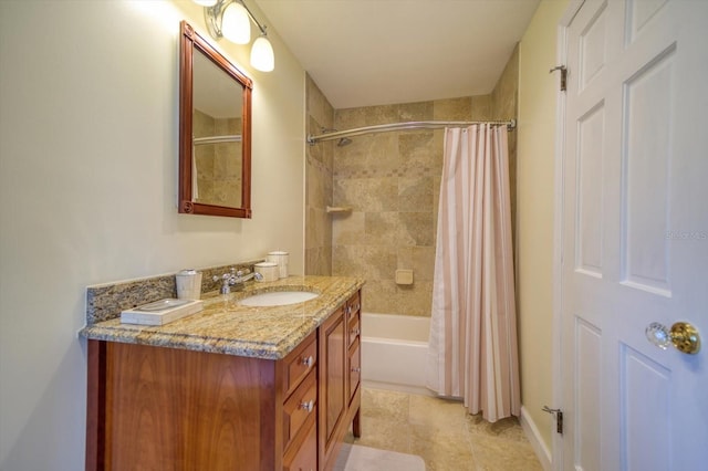 bathroom featuring oversized vanity, shower / bath combination with curtain, and tile floors