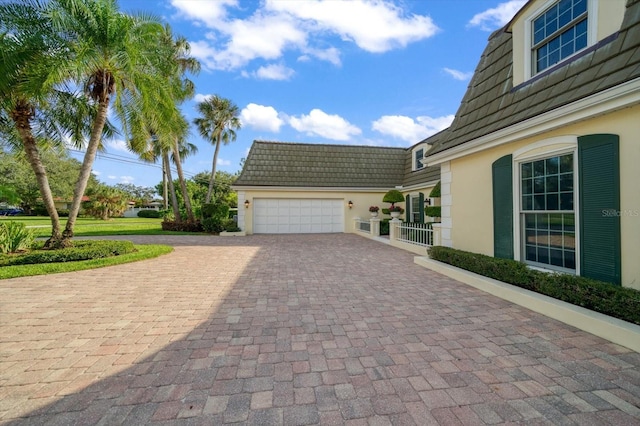 exterior space with a garage