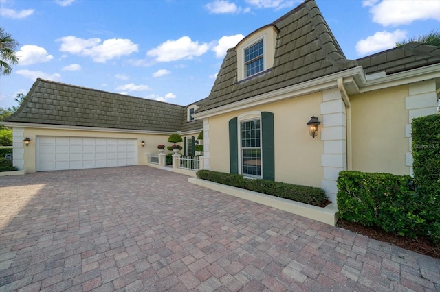 view of front of house with a garage