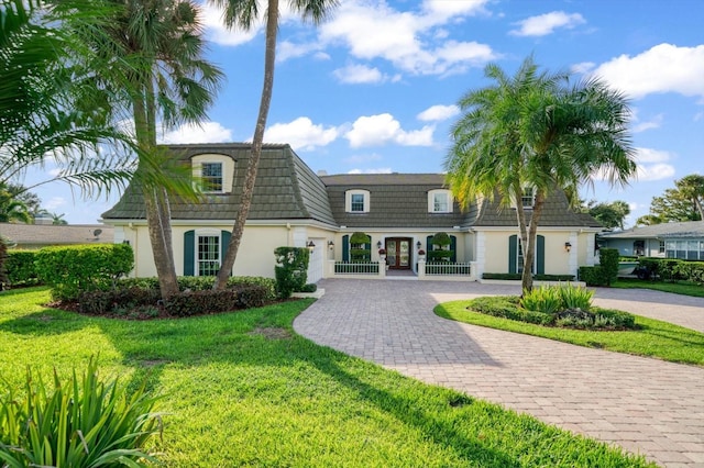 view of front of home with a front yard