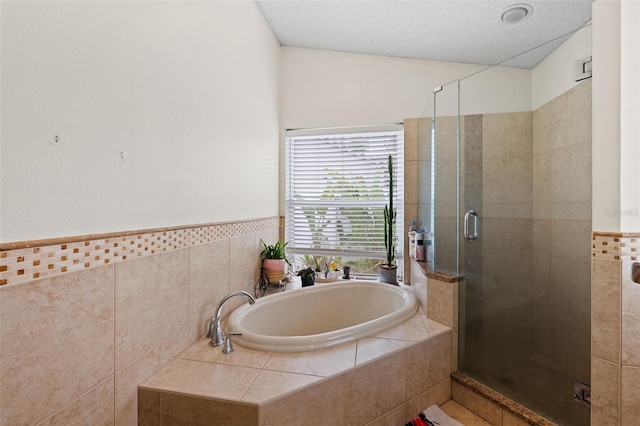 bathroom featuring plus walk in shower