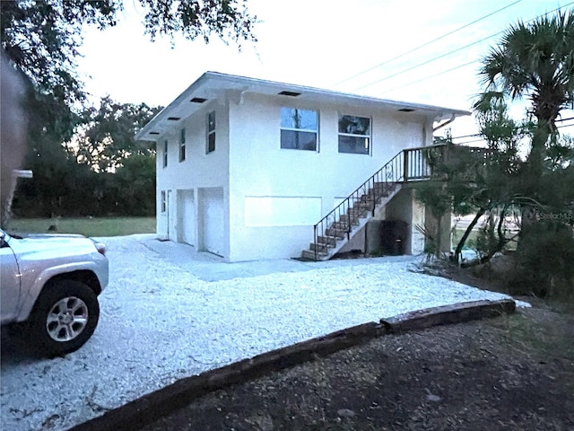 view of property exterior with a garage