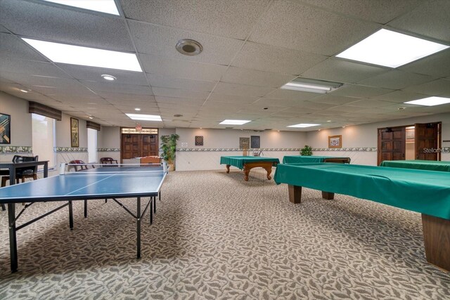 recreation room featuring billiards, a paneled ceiling, and carpet flooring