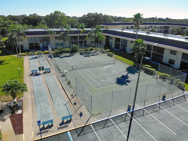 view of tennis court featuring shuffleboard