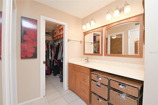 bathroom featuring vanity and tile patterned flooring