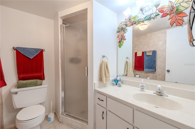bathroom with a shower stall, toilet, tile patterned flooring, and vanity