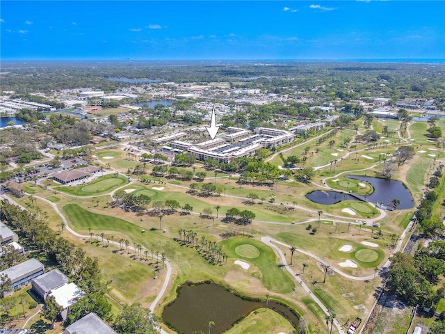 aerial view featuring a water view and view of golf course