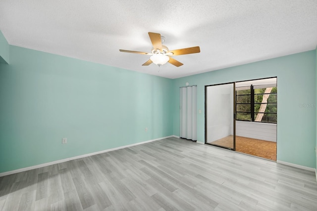 unfurnished bedroom featuring ceiling fan, light hardwood / wood-style floors, a closet, and a textured ceiling