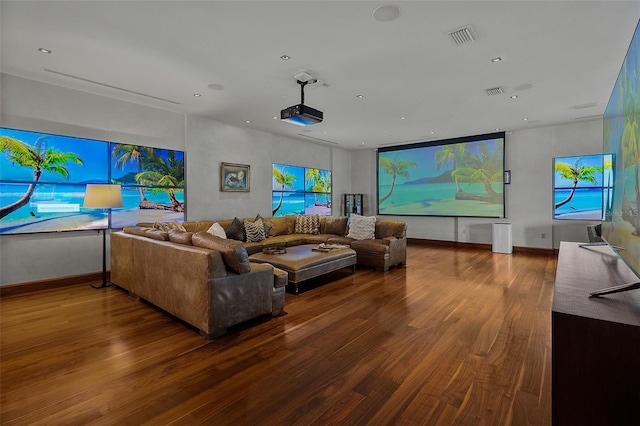 home theater room featuring hardwood / wood-style flooring