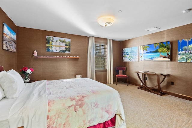 bedroom featuring light colored carpet