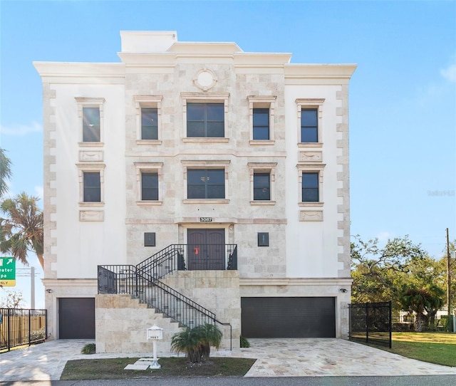 view of front of property with a garage