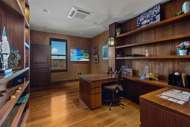 office space with light hardwood / wood-style flooring