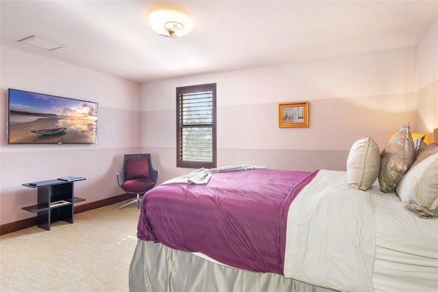 bedroom with light colored carpet