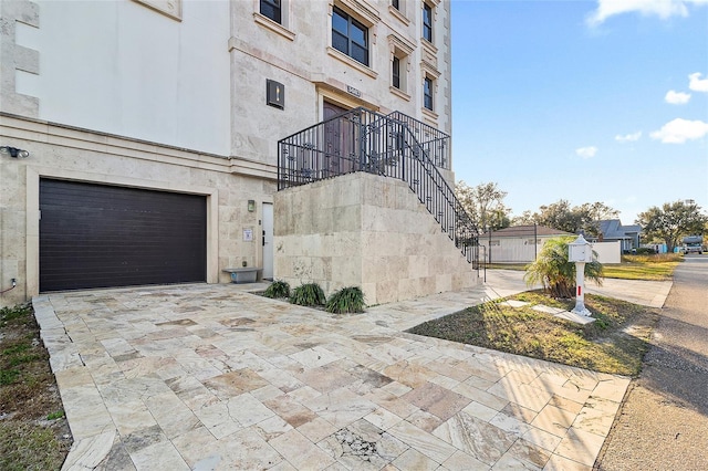 exterior space with a garage