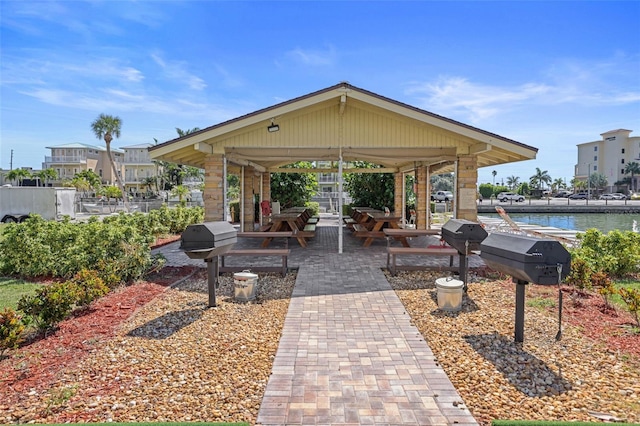 view of home's community featuring a gazebo and a water view