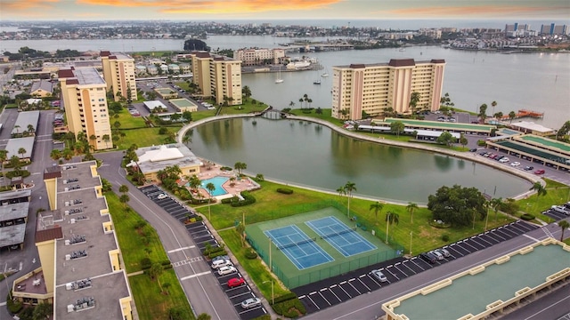 aerial view at dusk with a water view