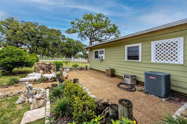 view of yard with central AC