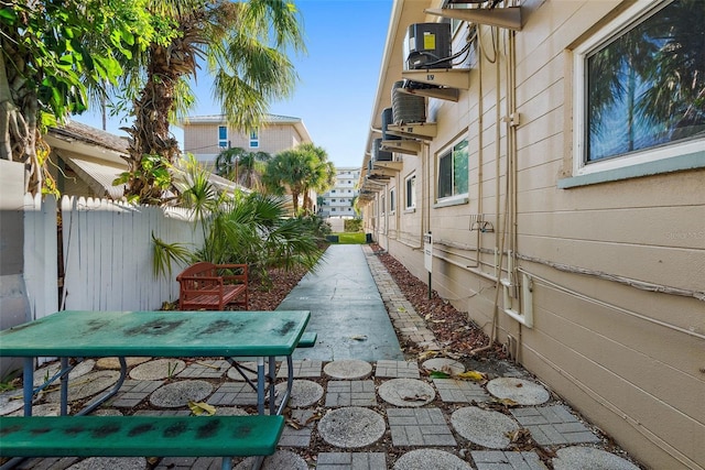 exterior space with a balcony and a patio