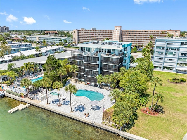 birds eye view of property with a water view