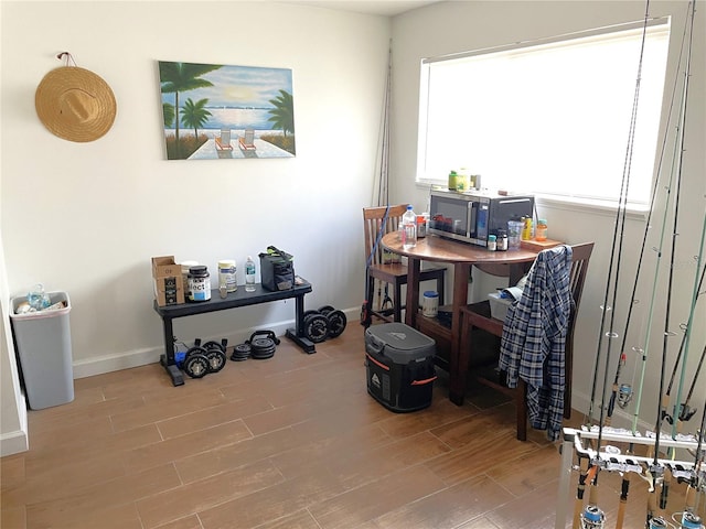 office area with light hardwood / wood-style flooring