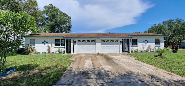 ranch-style house with a front lawn and a garage