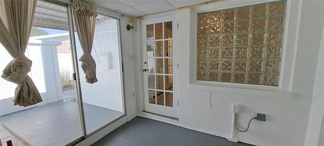 entryway with a paneled ceiling