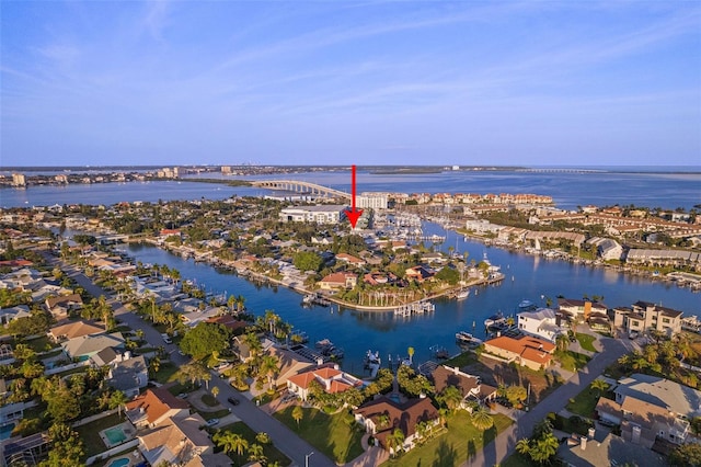 birds eye view of property featuring a water view