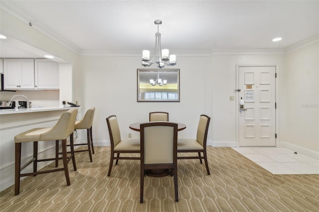 tiled dining space with a chandelier and ornamental molding