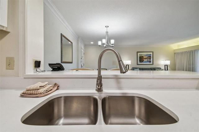 interior details with vanity, a notable chandelier, and ornamental molding