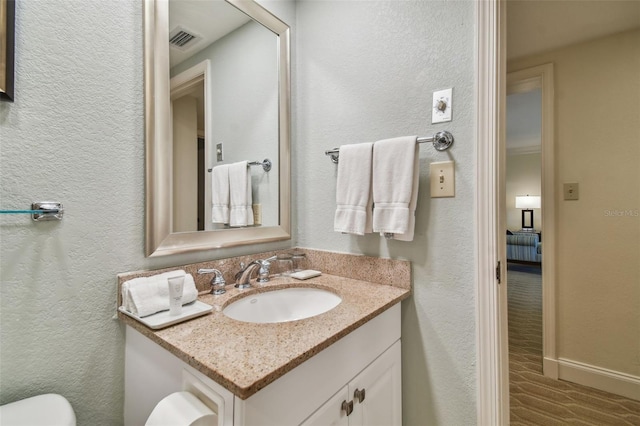 bathroom featuring large vanity