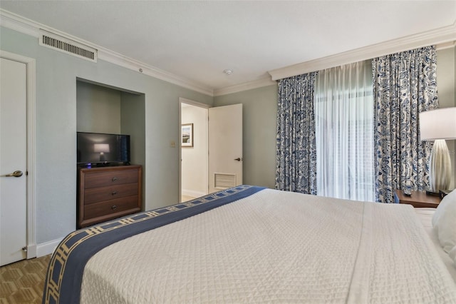 bedroom featuring ornamental molding