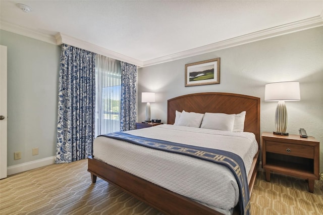 bedroom featuring crown molding