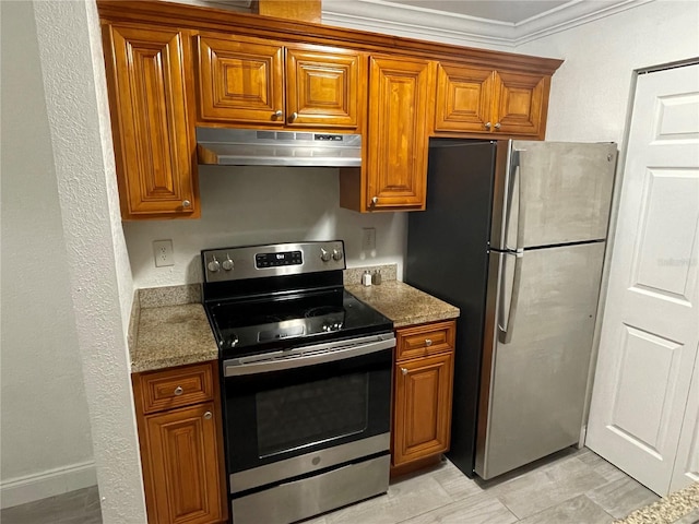 kitchen featuring light tile floors, ornamental molding, stainless steel appliances, and stone countertops