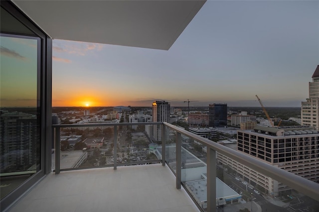 view of balcony at dusk