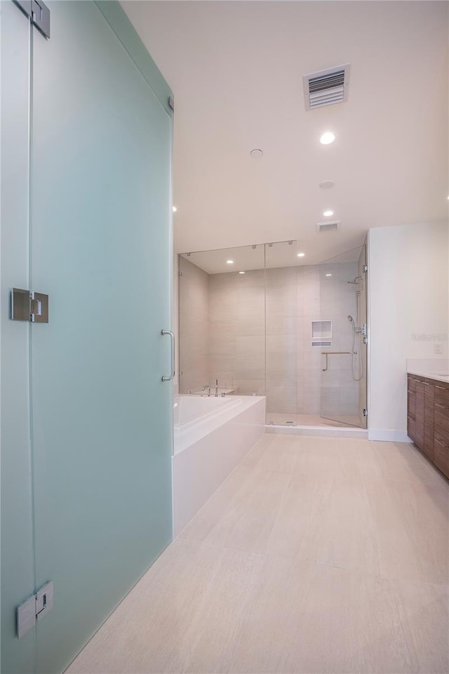 bathroom with independent shower and bath