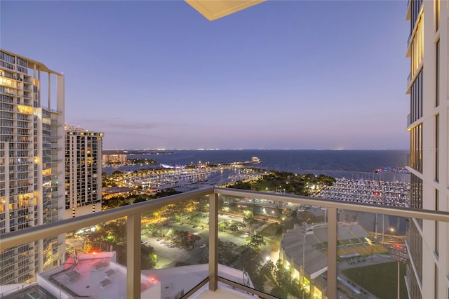 balcony at dusk with a water view