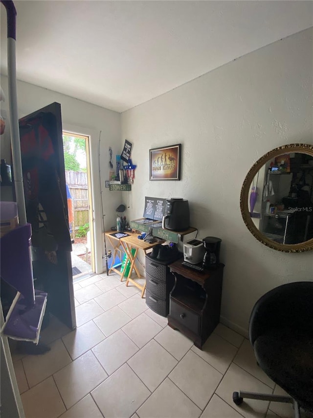 home office featuring light tile floors